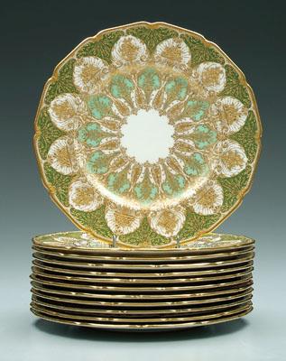 Appraisal: Royal Doulton service plates heavily encrusted with green and gilt