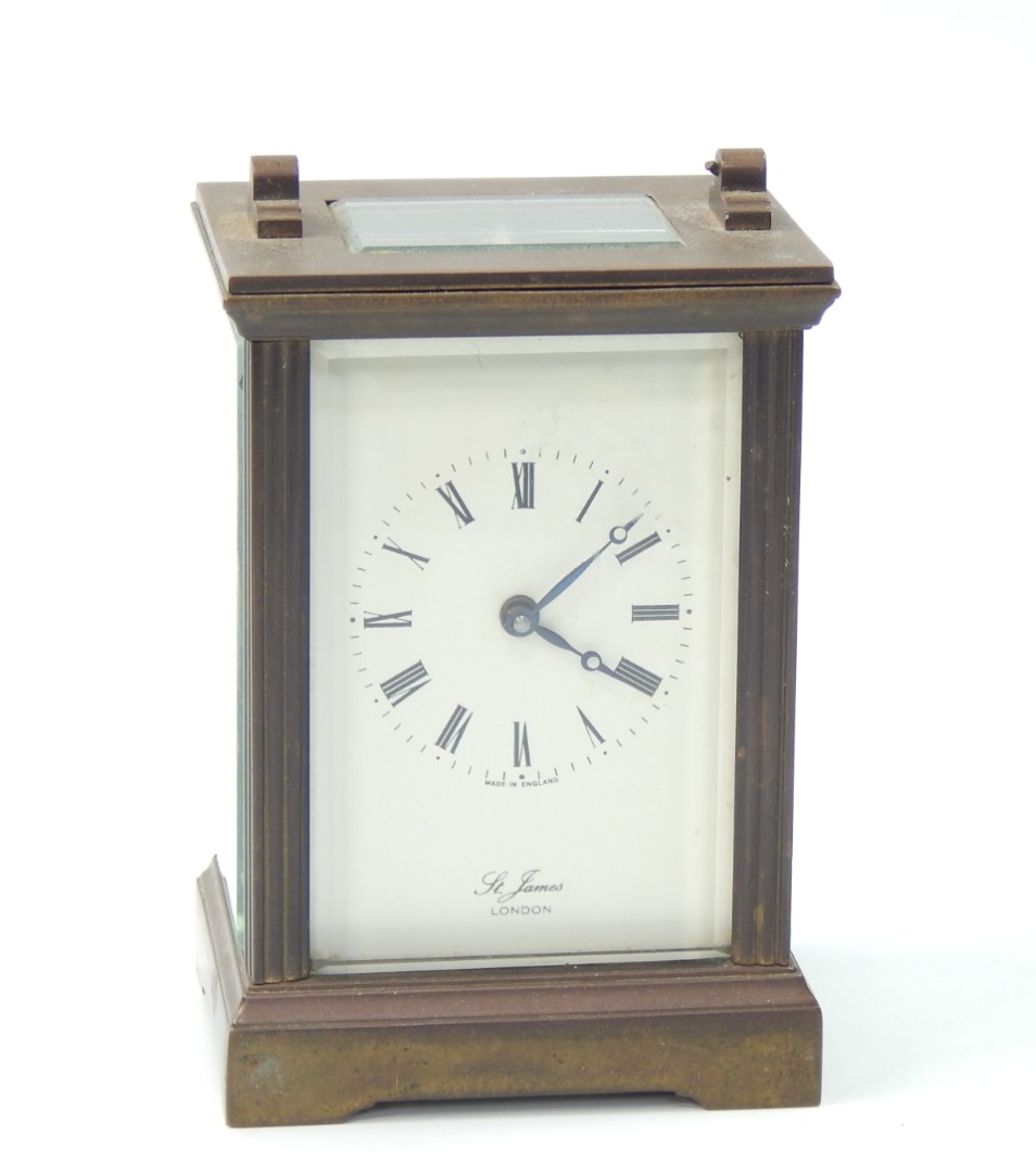 Appraisal: A brass carriage clock by St James London white enamel