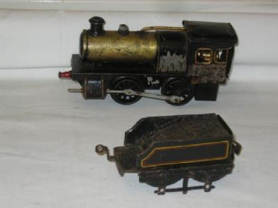 Appraisal: A small - - spirit fired locomotive single oscillating cylinder