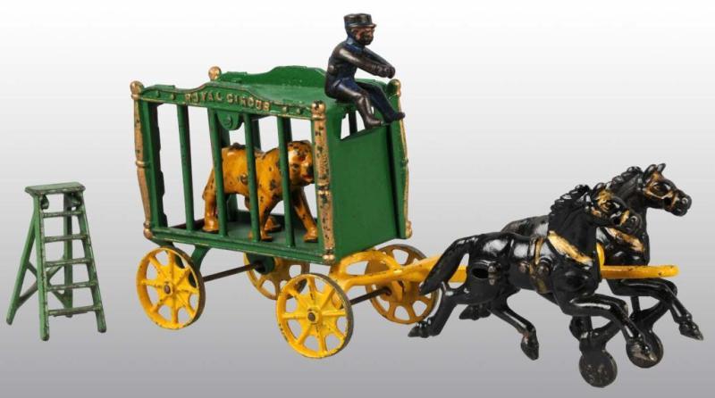 Appraisal: Cast Iron Hubley -Horse Royal Circus Cage Wagon Description Includes