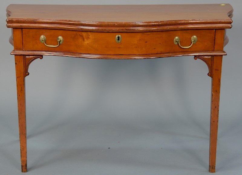 Appraisal: Federal cherry game table with serpentine top over conforming drawer