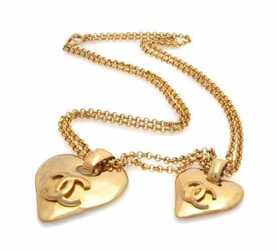 Appraisal: A Chanel Multistrand Chainlink and Heart Pendant Necklace Stamped Chanel