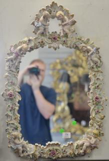 Appraisal: Mirror with French porcelain framed figures and flowers x Mirror