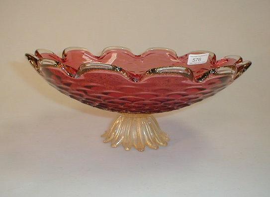 Appraisal: A large pink and clear glass with gold inclusions bowl