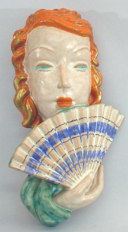 Appraisal: Goldscheider terracotta glazed face mask modelled by Rudolf Knorlein of