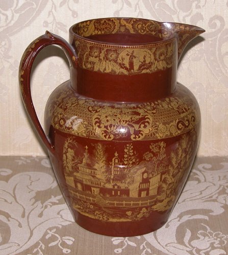 Appraisal: Title Redware Portobello Brown Glaze Pitcher with Oriental Transfer Medium