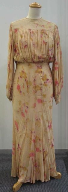 Appraisal: Evening dress in printed cream georgette ruched bodice some discolouration