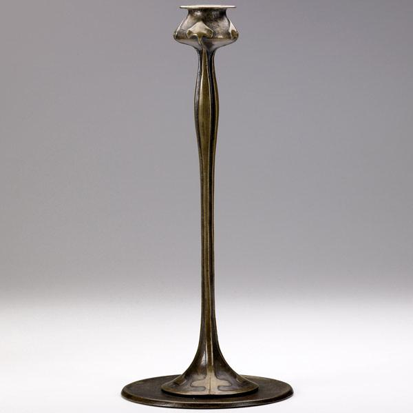 Appraisal: JARVIE Tall Art Nouveau candlestick embossed with spade-shaped leaves on