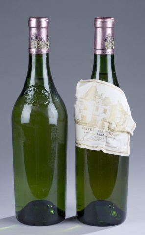 Appraisal: Two Bottles One with crumpled label one without label Refrigerator