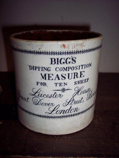 Appraisal: A th Century sheep dip measure for Bigg's Dipping Composition