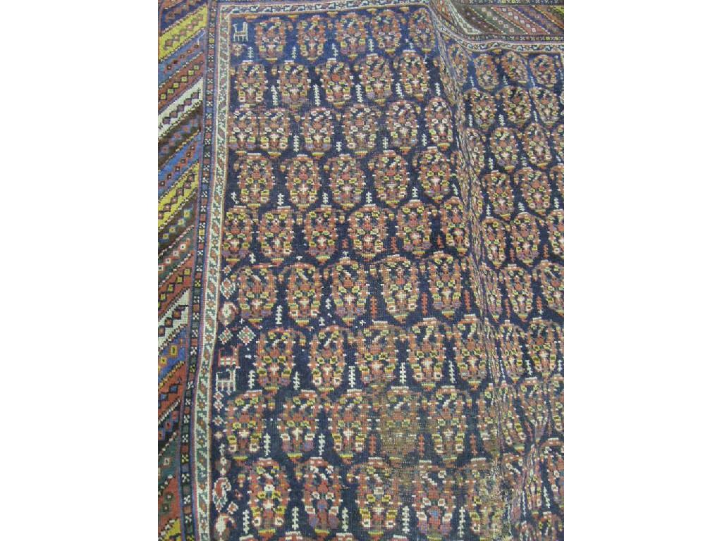 Appraisal: An antique Middle Eastern carpet with a field of boteh