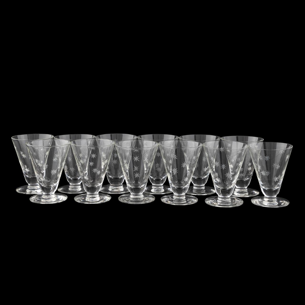 Appraisal: SET VINTAGE ATOMIC STAR MOTIF COCKTAIL GLASSES American mid-twentieth century