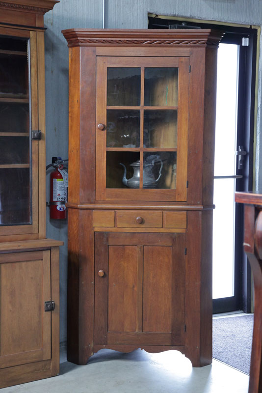 Appraisal: TWO PIECE CORNER CUPBOARD Small size walnut cupboard having a