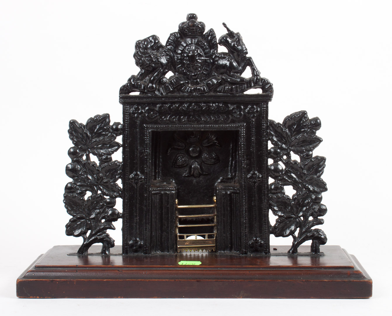 Appraisal: Victorian painted cast iron miniature fireplace late th century painted