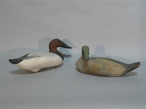 Appraisal: TWO PAINTED WOODEN DUCK DECOYS One inscribed Madison Mitchell Harve