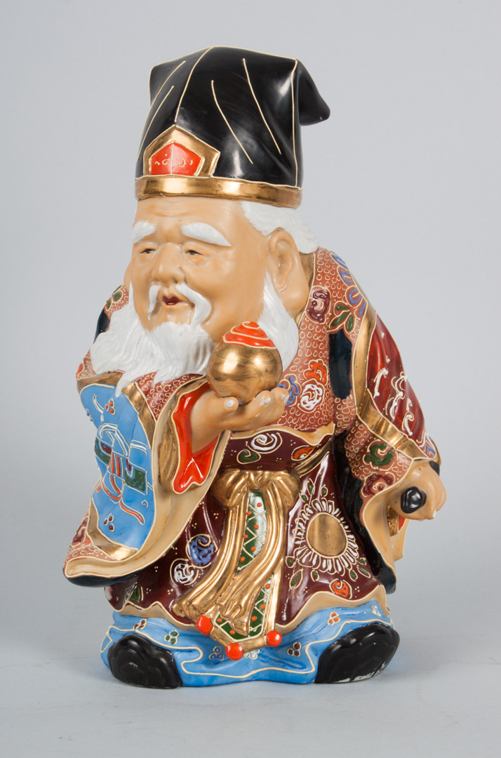 Appraisal: Japanese Satsuma porcelain figure either Taoist priest or immortal parcel-gilt