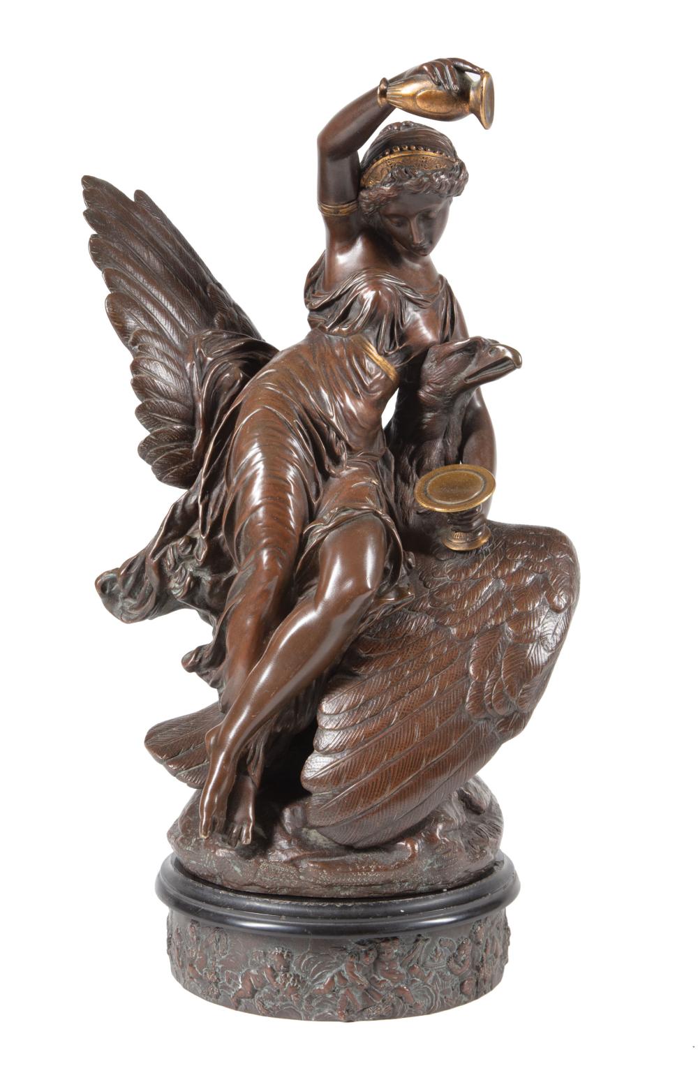 Appraisal: Patinated Bronze Figural Group of a Woman Seated on an