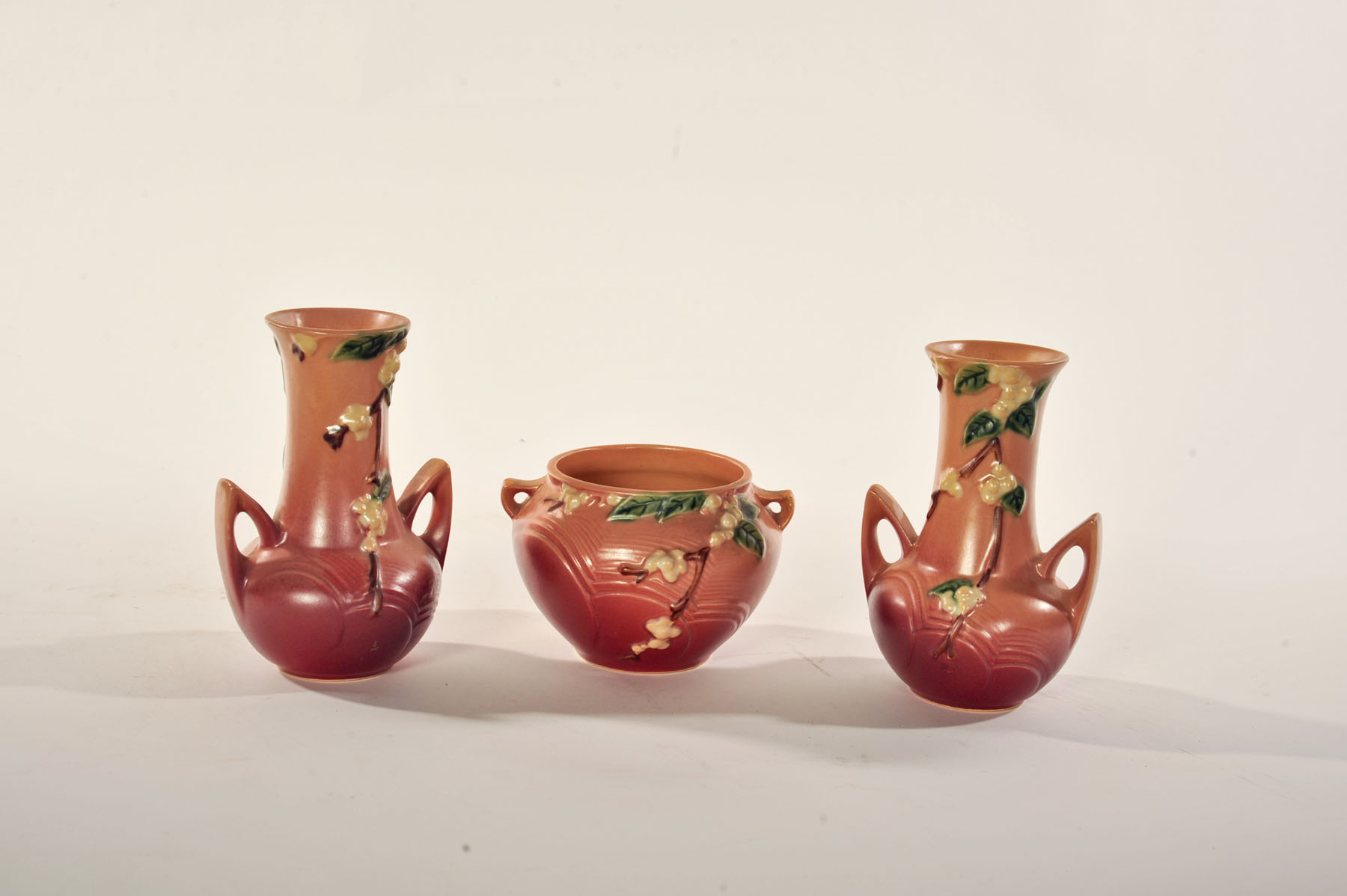 Appraisal: THREE PIECES OF ROSEVILLE ART POTTERY Ohio rd quarter- th