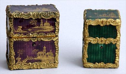 Appraisal: TWO LOUIS XV GILT-METAL MOUNTED ENAMEL SCENT BOXES The larger