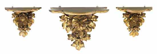 Appraisal: A Set of Three Italian Giltwood Wall Brackets comprising a