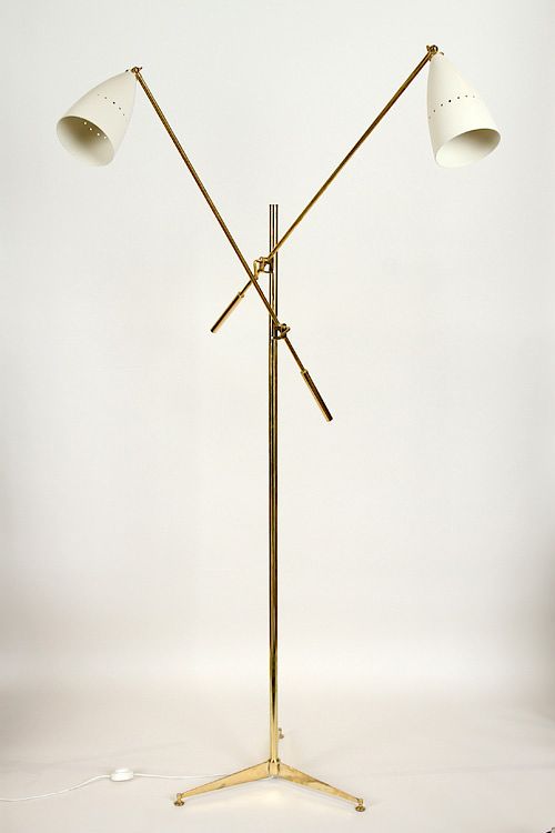 Appraisal: BRASS STILNOVO STYLE TWO ARM FLOOR LAMP A brass Stilnovo