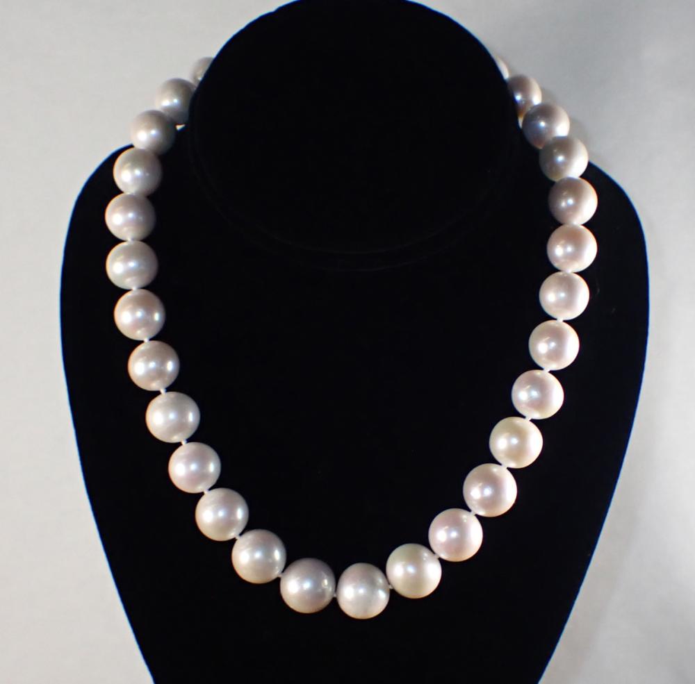 Appraisal: PRINCESS LENGTH PEARL AND EIGHTEEN KARAT GOLD NECKLACE - hand-knotted