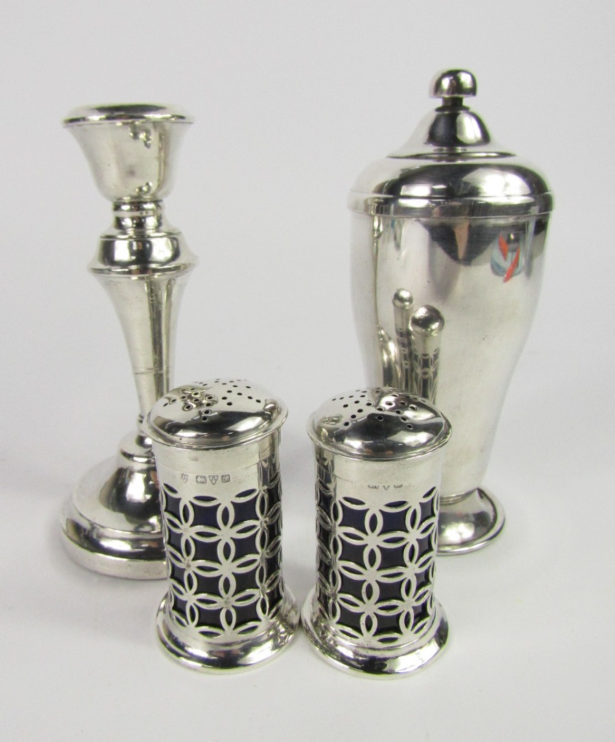 Appraisal: A pair of George V silver pepperettes of pillar box