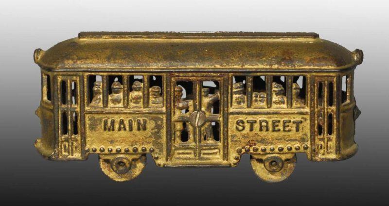 Appraisal: Cast Iron Main Street Trolley Still Bank Description s Manufactured