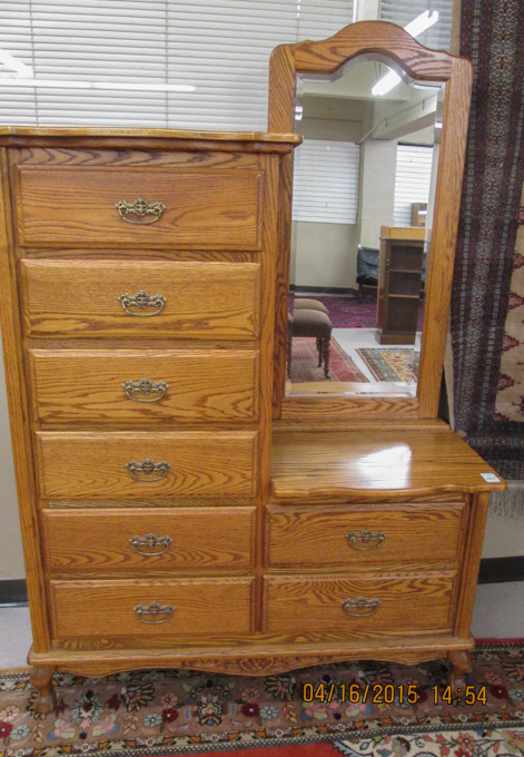 Appraisal: VICTORIAN STYLE OAK DRESSER the left half a column of