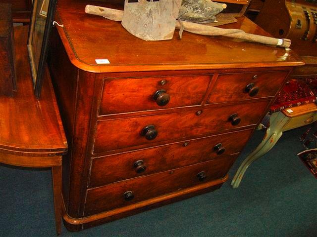 Appraisal: A Victorian mahogany chest of two short and three long