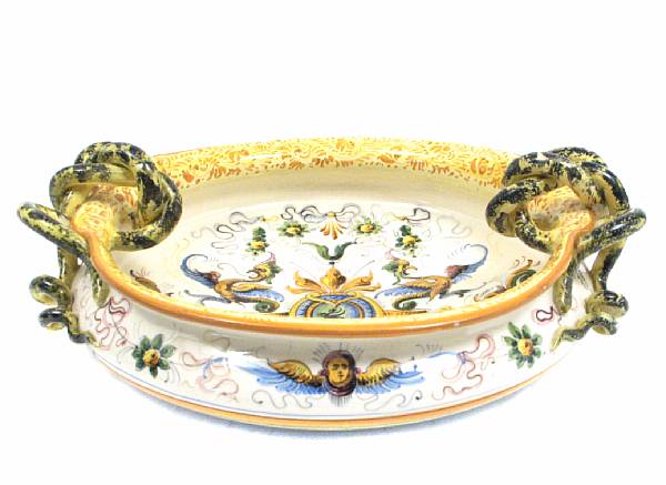 Appraisal: An Italian maiolica style bowl with entwined snake handles height