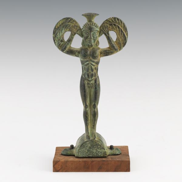 Appraisal: BRONZE WINGED FIGURE ON STAND x including stand Archaic style