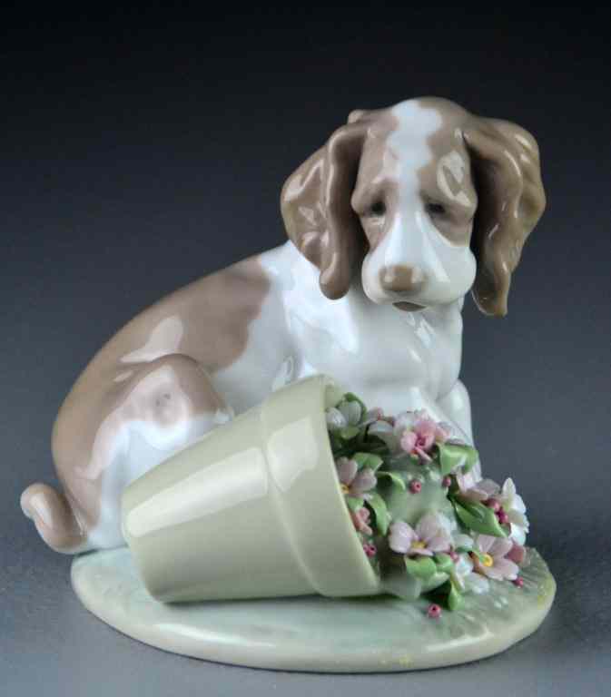 Appraisal: Lladro Porcelain Figurine ''It Wasn't Me ''''Travesura'' depicting a dog