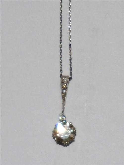 Appraisal: DIAMOND NECKLACE ca Platinum Charming pendant of old mine cut