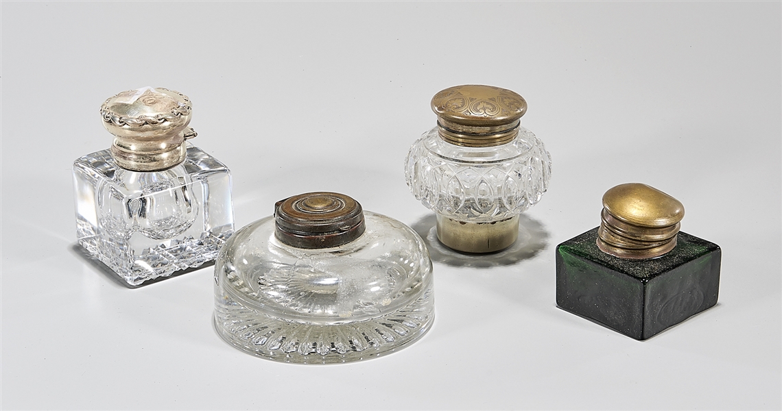 Appraisal: Four vintage glass inkwells with hinged covers once colored glass