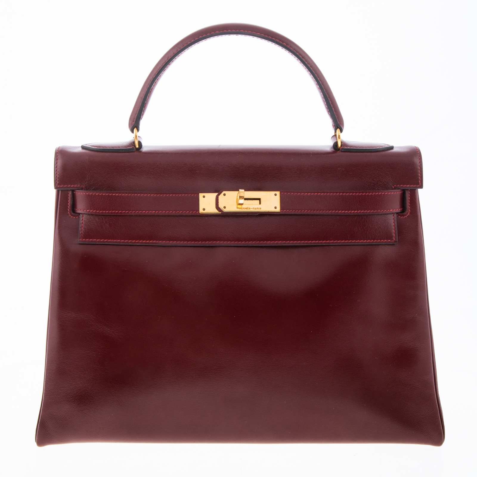 Appraisal: AN HERMES RETOURNE KELLY BOX A Bordeaux box leather Hermes