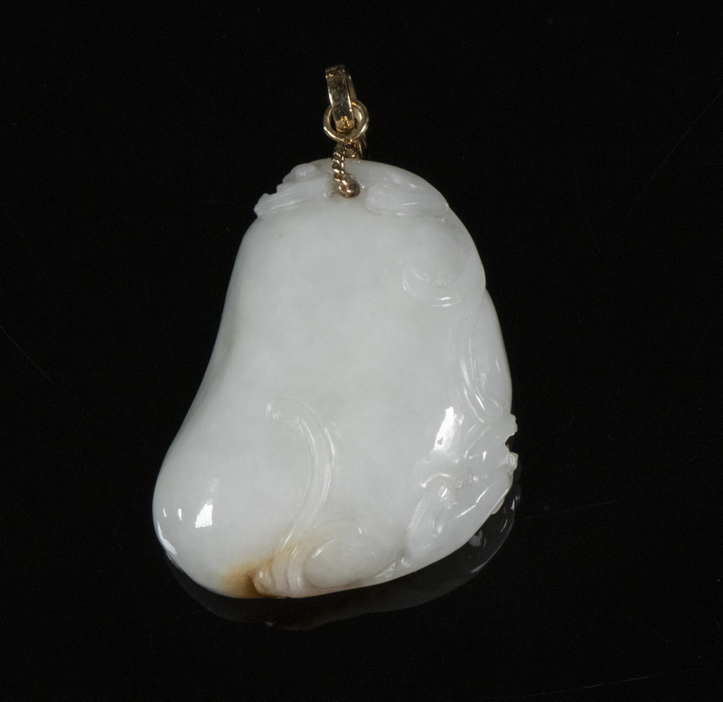 Appraisal: CARVED WHITE JADE PENDANT Chinese carved white jade with russet