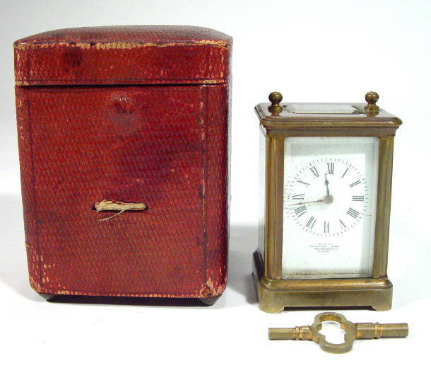 Appraisal: Victorian miniature brass cased carriage clock with bevelled glass panels