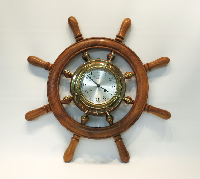 Appraisal: HOWARD MILLER SHIPS WHEEL CLOCK brass case clock with spring