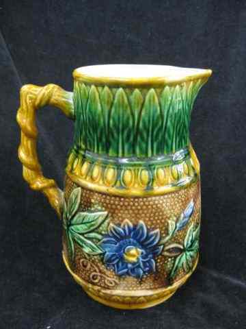 Appraisal: Majolica Pottery Pitcher fine floral leaf decor '' light crazing