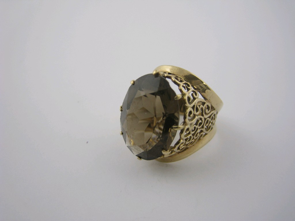 Appraisal: A Smoky Quartz Dress Ring the large oval-cut stone claw-set