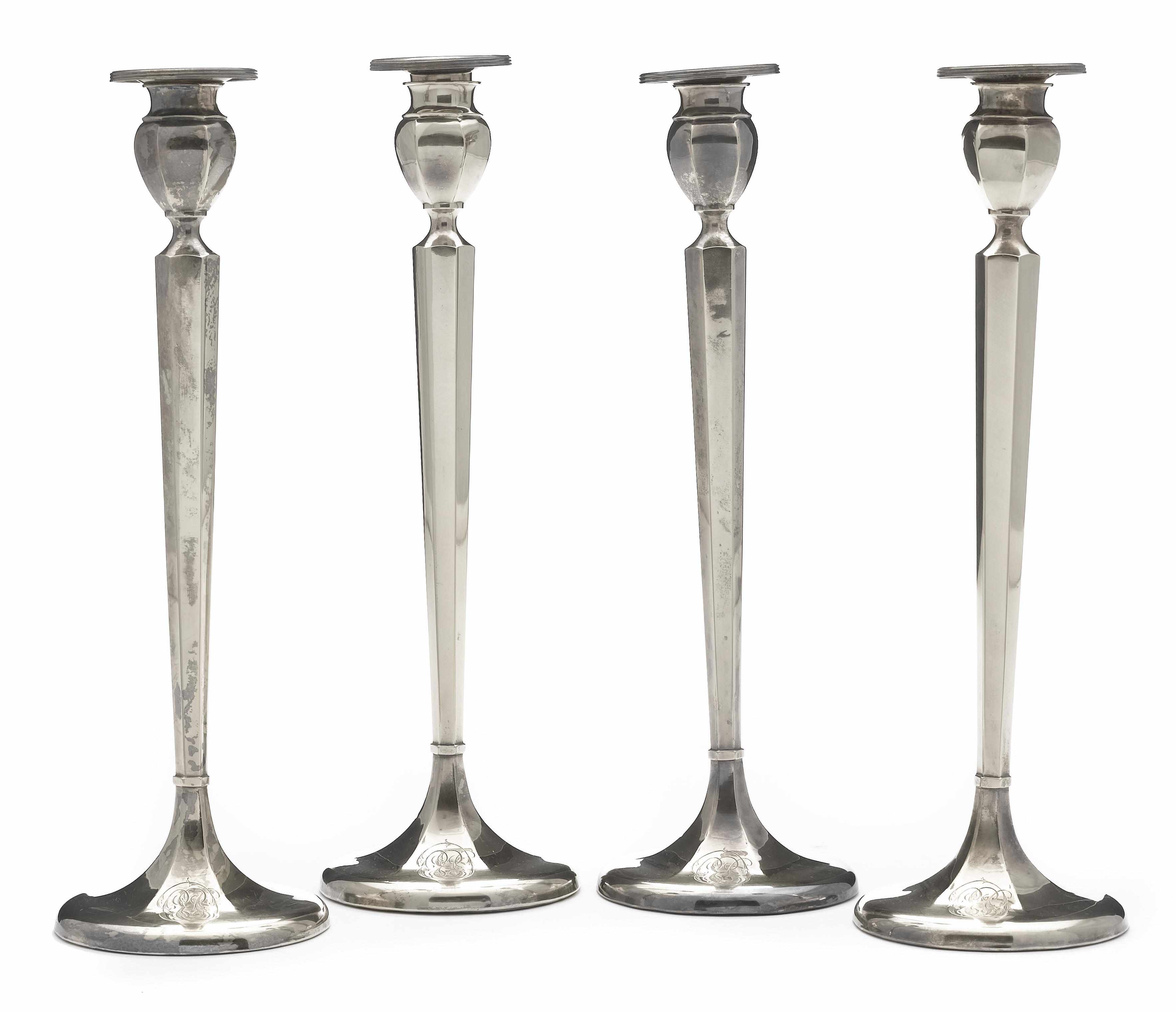 Appraisal: A sterling-gilt set of four weighted candlesticks La Pierre Mfg