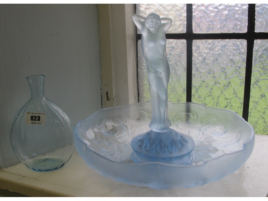 Appraisal: Moulded pale blue and glass centrepiece and a blue glass