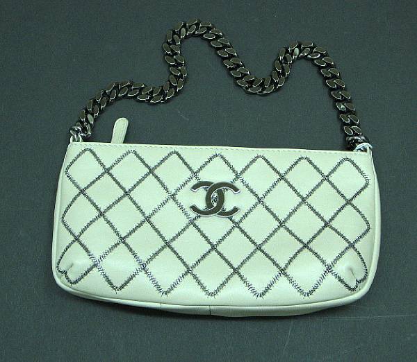 Appraisal: A Chanel ivory leather and metal 'quilted' purse approximate height