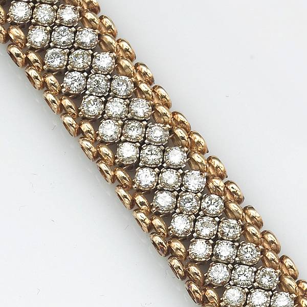 Appraisal: A diamond and k bicolor gold triple row bracelet estimated