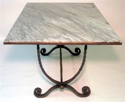 Appraisal: Baroque style steel marble top dining table The rectangular gray