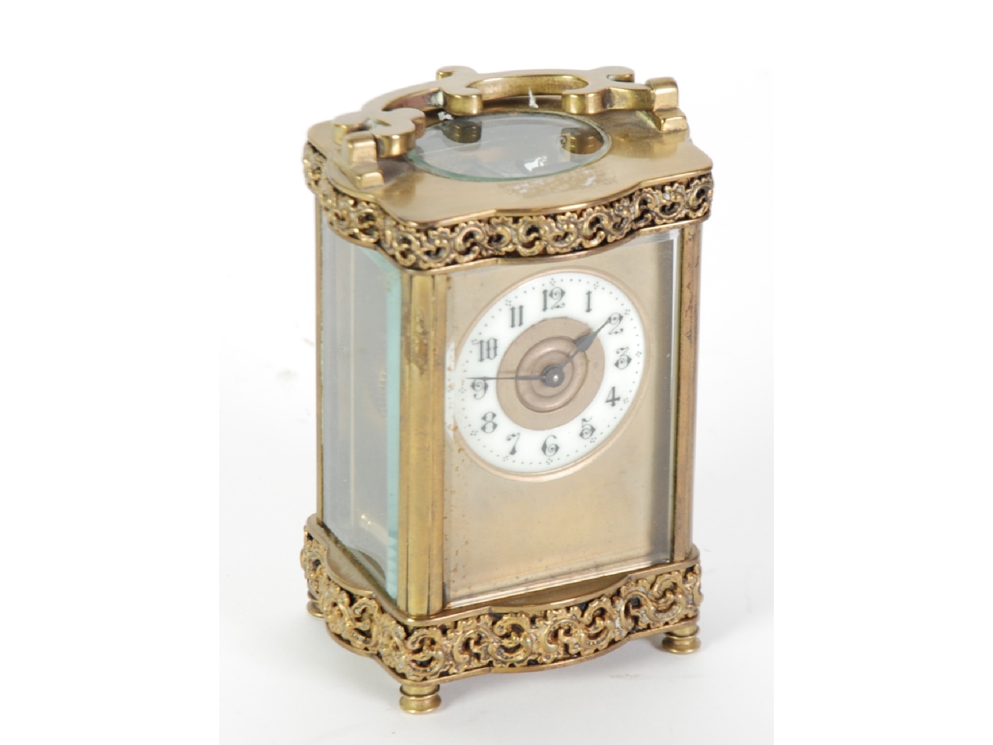 Appraisal: AN EDWARDIAN CARRIAGE CLOCK with white emamelled roman dial in