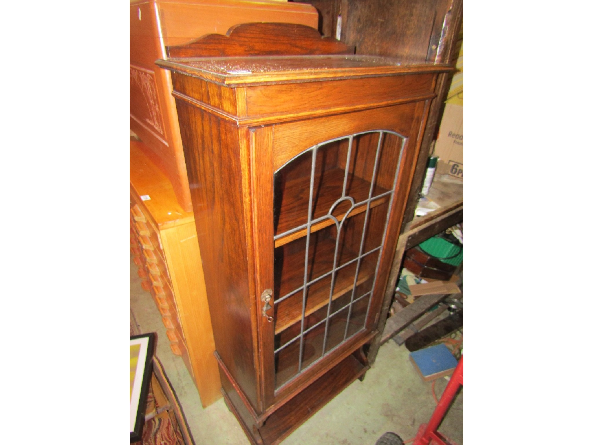 Appraisal: An early th century oak side cabinet freestanding and enclosed