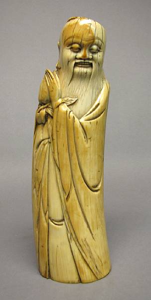 Appraisal: An ivory figure of Shoulao th th Century Standing in