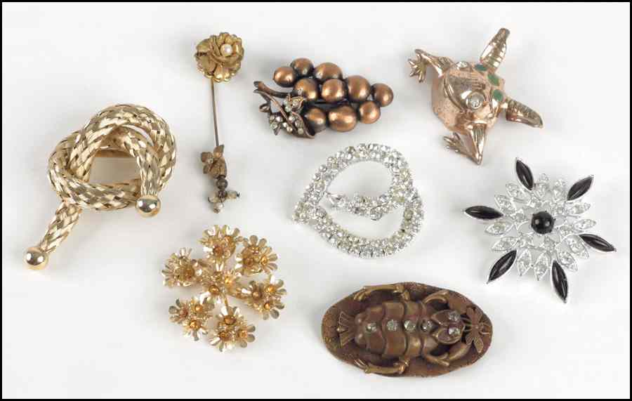 Appraisal: COLLECTION OF BROOCHES Comprised of an Emmons black glass bead